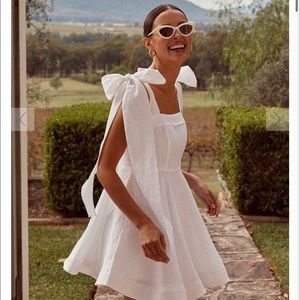 DISSH: Aisle White Linen Bow Mini Dress